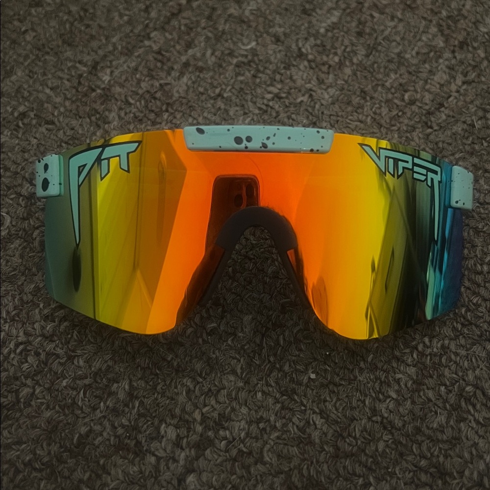 Pit Viper Sunglasses with Vibrant Orange and Teal Lenses